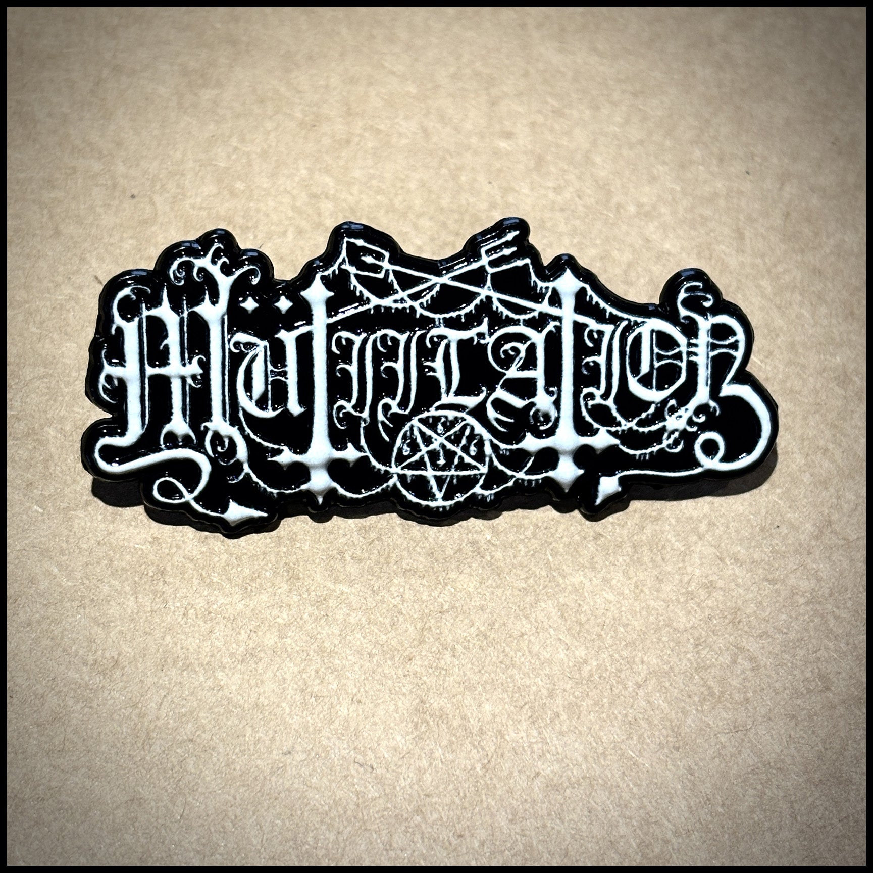 MÜTIILATION: official metal pin badge