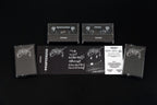 MYSTICUM: Industries of Inferno (ltd 8 cassette boxset & hardcover book + pendant and chain, patches, flag, posters)